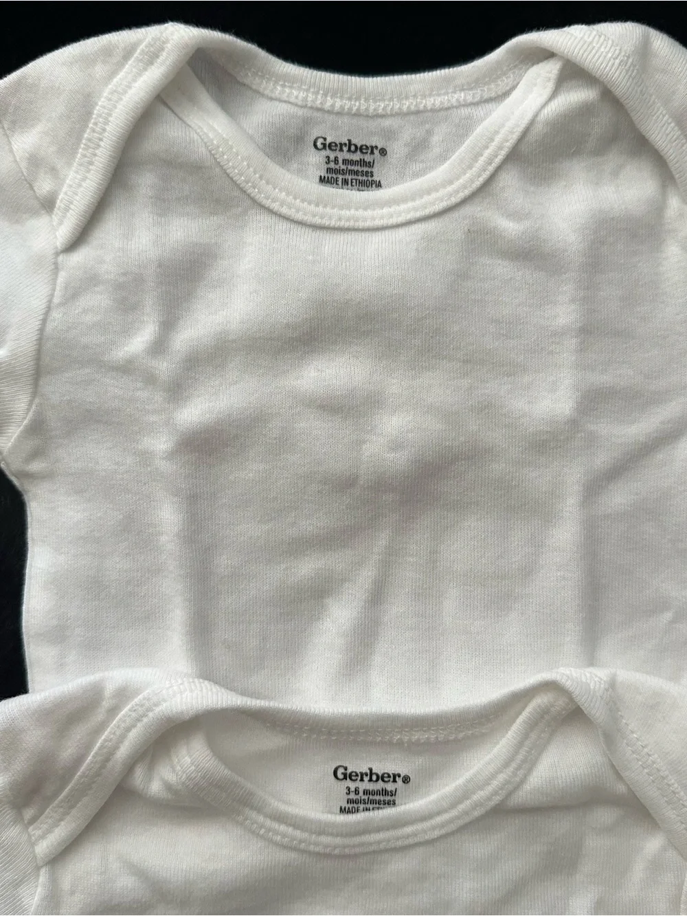 5 Pack White & Cream Baby Bodysuits
